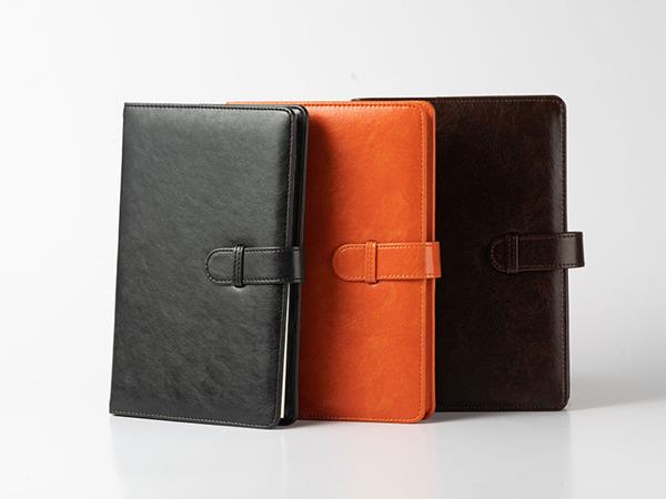 PU Leather black/orange notebooks, magnetic buckle, 80 squared pages 